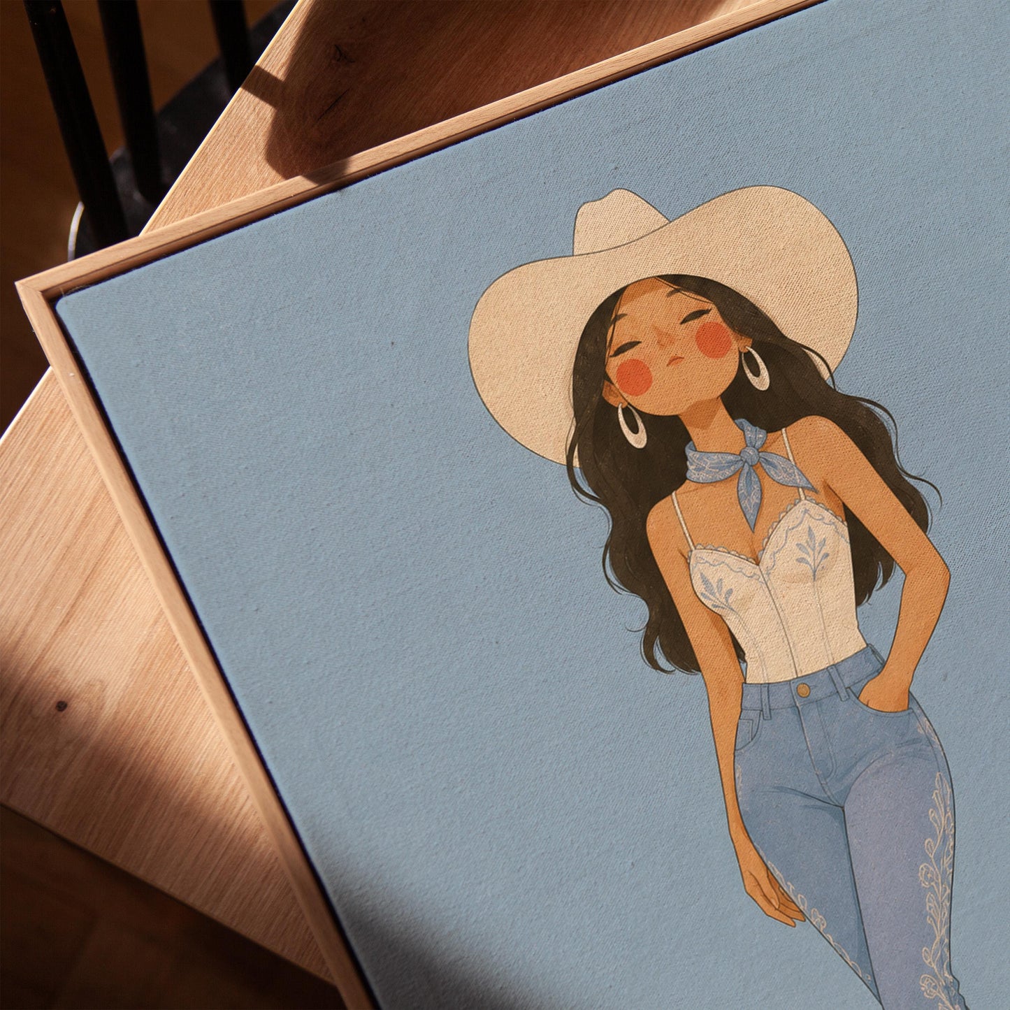 Cowgirl in flare jeans and white top against a dusty blue field, canvas print in a warm, minimally styled interior