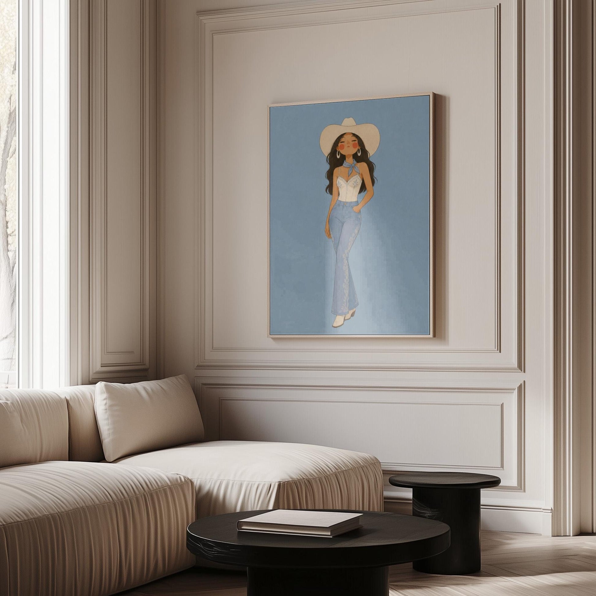 Cowgirl in flare jeans and white top against a dusty blue field, canvas print displayed on a neutral wall in a styled interior