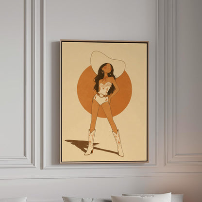 Cowgirl in a white star bodysuit against a large burnt orange sun disc, canvas print in a bright room with natural daylight