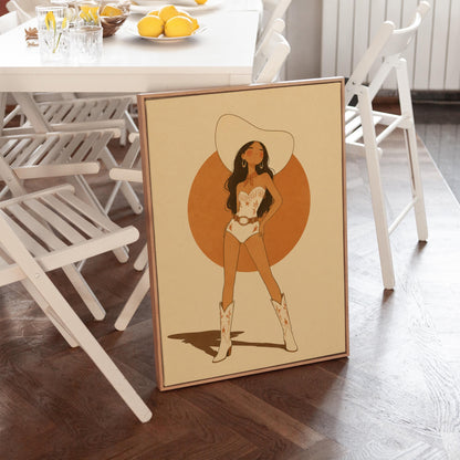 Cowgirl in a white star bodysuit against a large burnt orange sun disc, canvas print presented in a light, minimal room