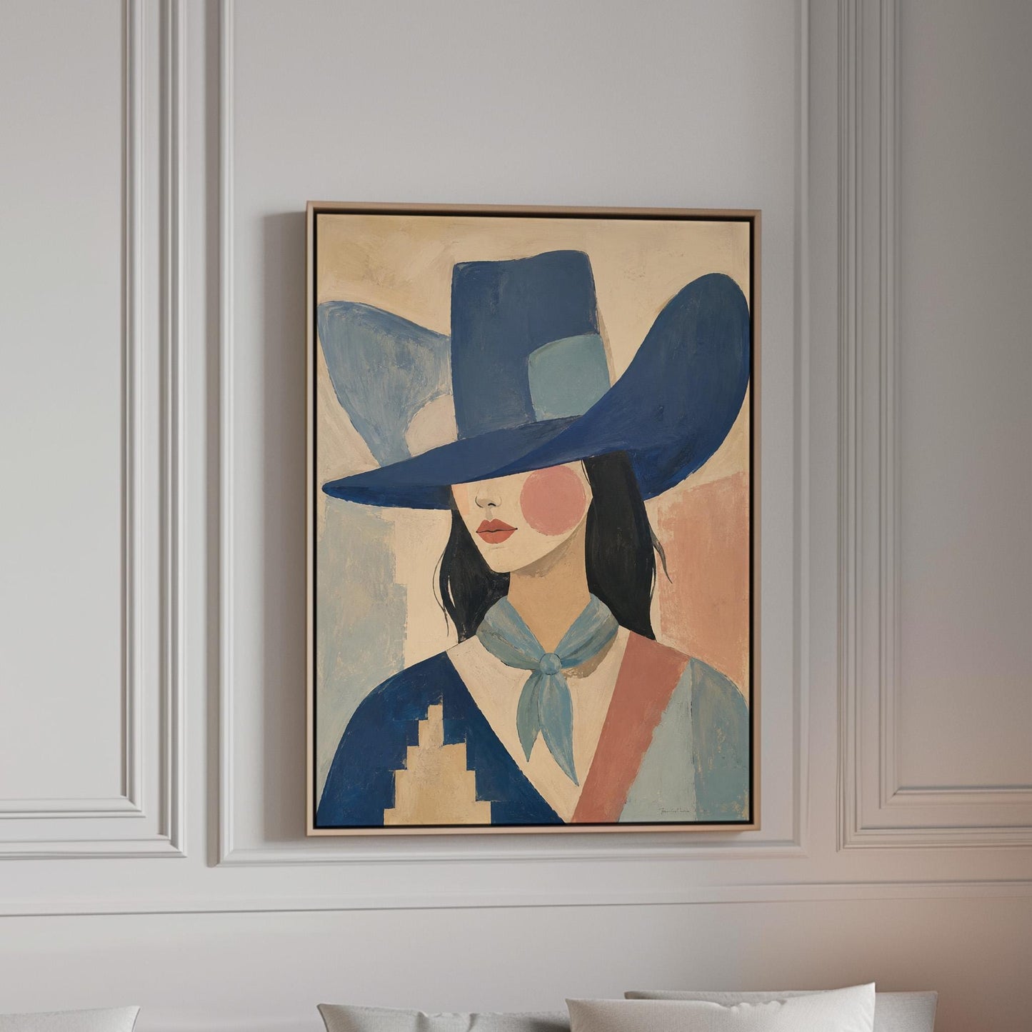 Cowgirl in a deep blue hat and pale scarf on a soft abstract ground, canvas print in a bright room with natural daylight