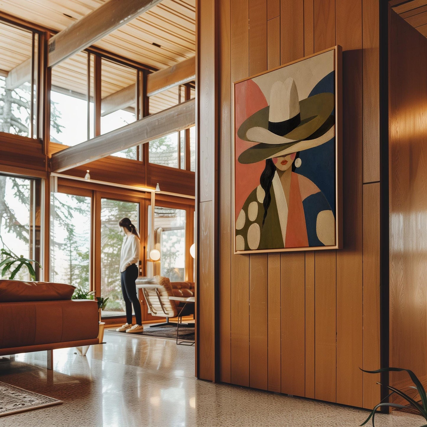 Cowgirl in a tall cream hat and spotted coat on coral and navy, canvas print shown to scale in a furnished room