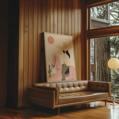 Cowgirl in a pale hat riding a soft pink horse past a desert cactus, canvas wall art styled against a soft white wall