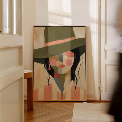 Cowgirl in olive hat with a patchwork face of soft color blocks, canvas wall art presented in a light, minimal room