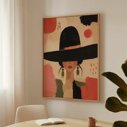 Woman in a wide black hat with olive earrings on red brushwork, canvas wall art styled against a soft white wall