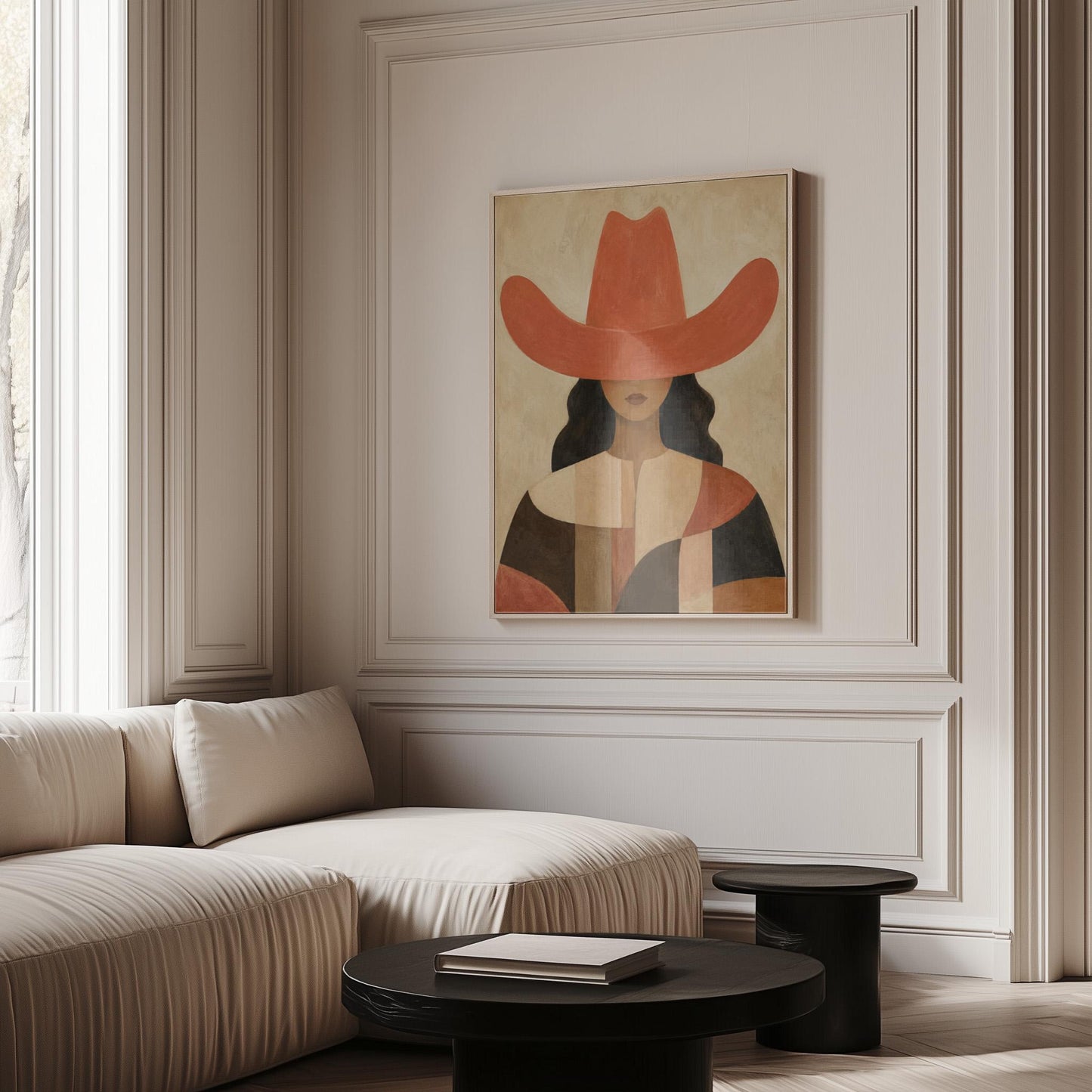 Cowgirl in a broad terracotta hat and patchwork western shirt, canvas wall art styled against a soft white wall