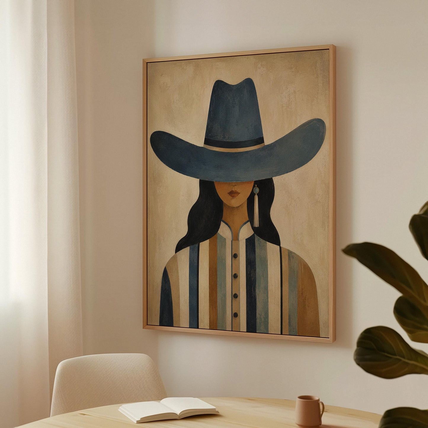 Cowgirl in a slate blue hat and striped shirt on warm sand, canvas print shown to scale in a furnished room