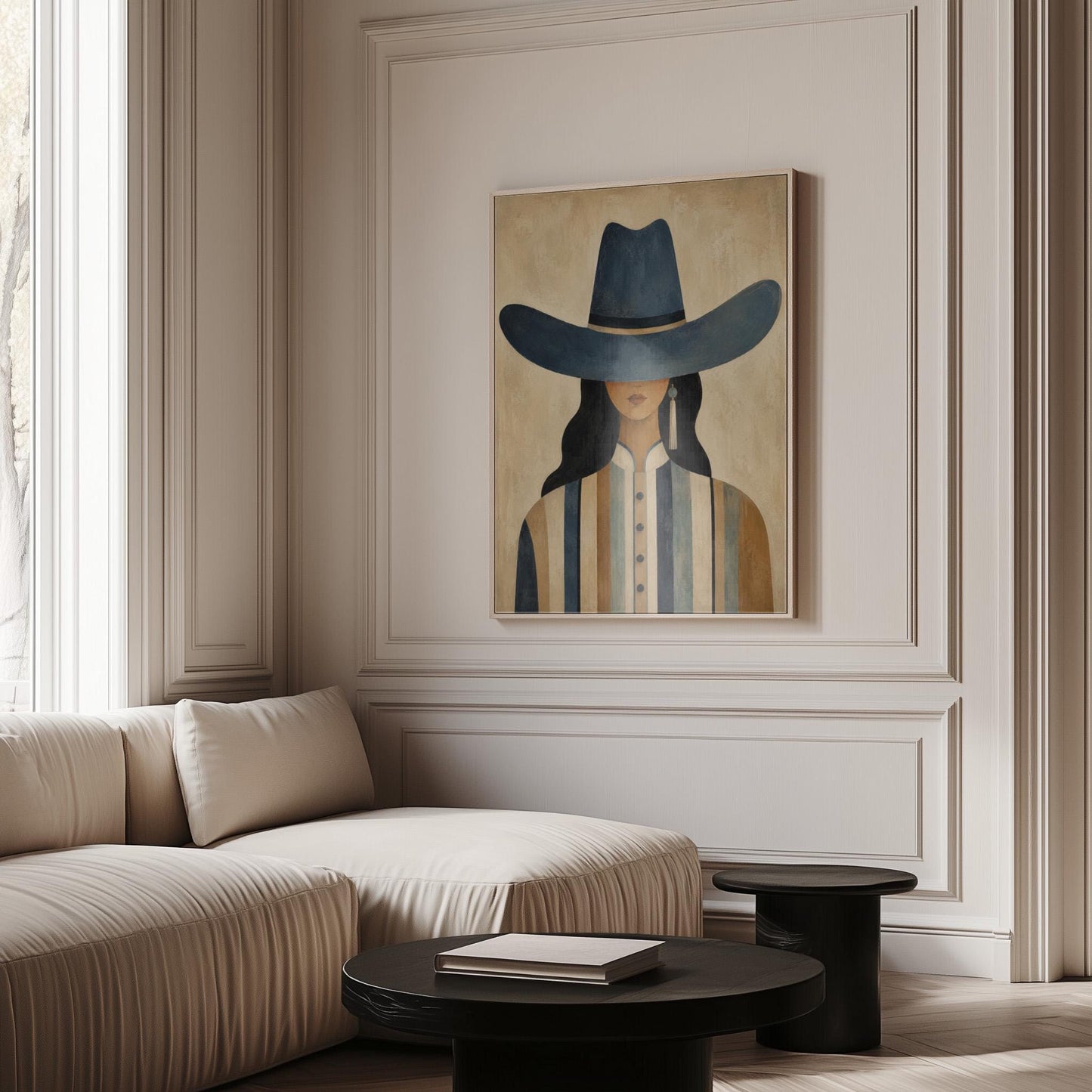 Cowgirl in a slate blue hat and striped shirt on warm sand, canvas wall art styled against a soft white wall