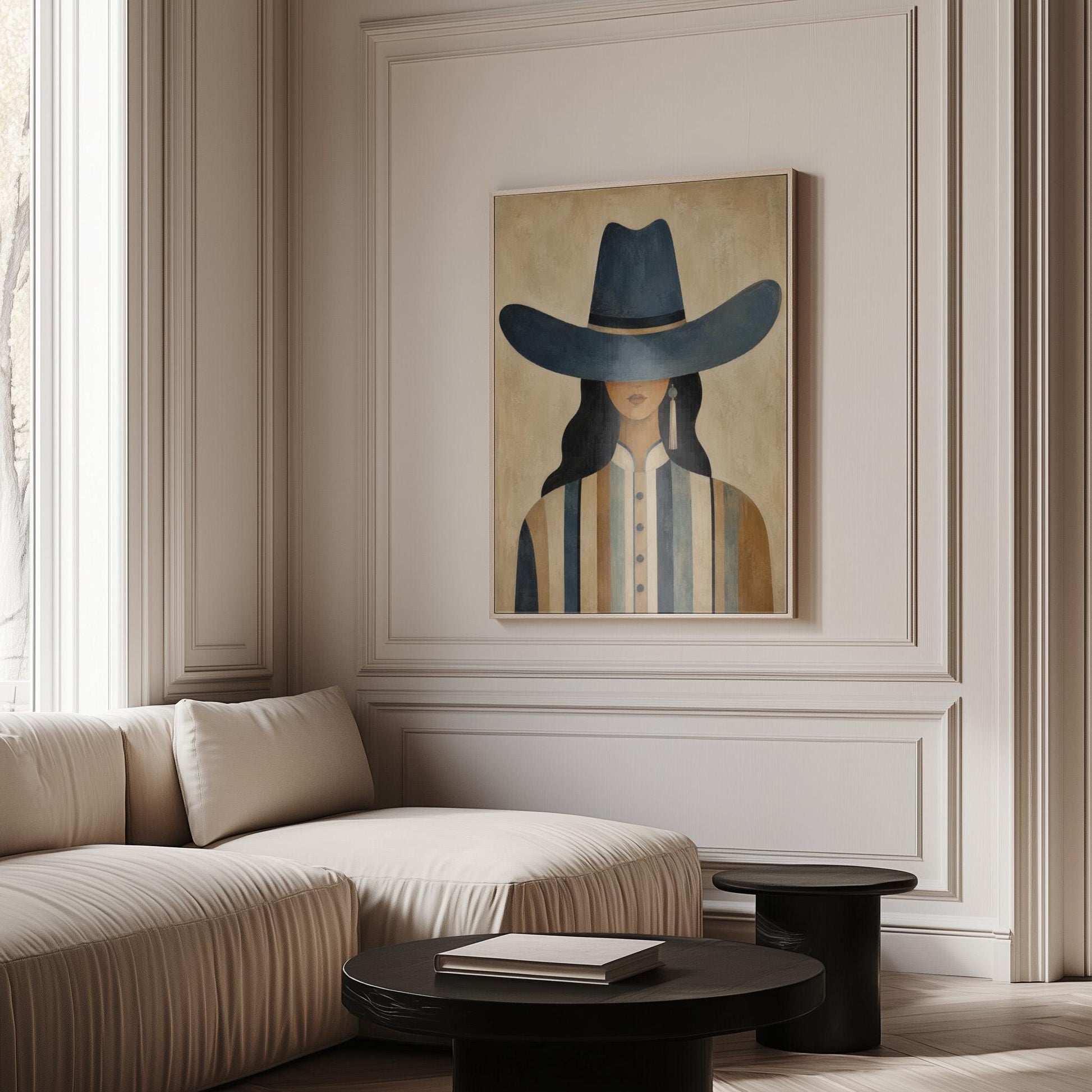 Cowgirl in a slate blue hat and striped shirt on warm sand, canvas wall art styled against a soft white wall