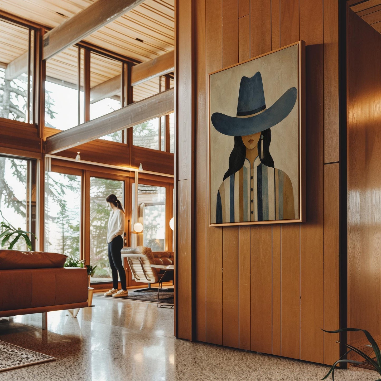 Cowgirl in a slate blue hat and striped shirt on warm sand, canvas wall art on a quiet wall in a considered interior