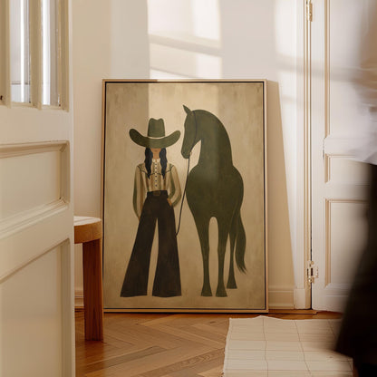 Cowgirl in wide trousers leading a flat olive green horse, canvas wall art styled against a soft white wall