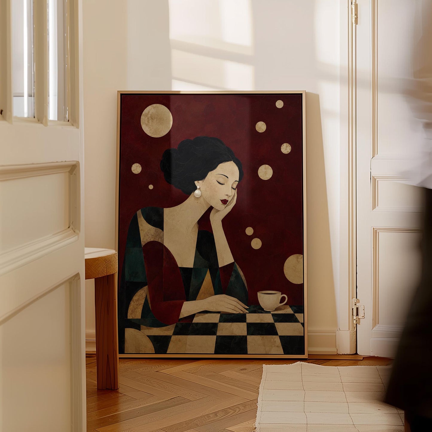 Art deco woman resting her chin on her hand beside a white coffee cup, canvas print presented in a light, minimal room