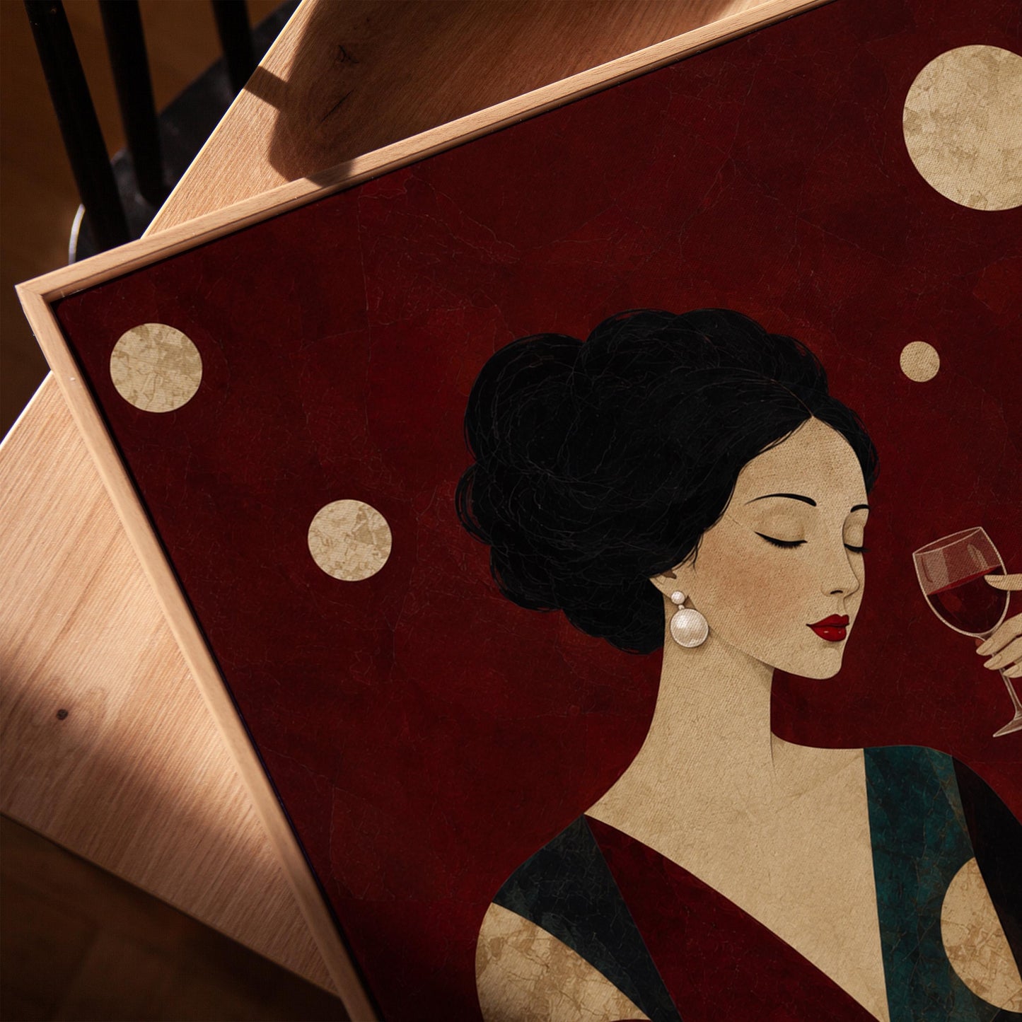 Woman with closed eyes lifting a glass of red wine at a dark table, canvas print in a warm, minimally styled interior