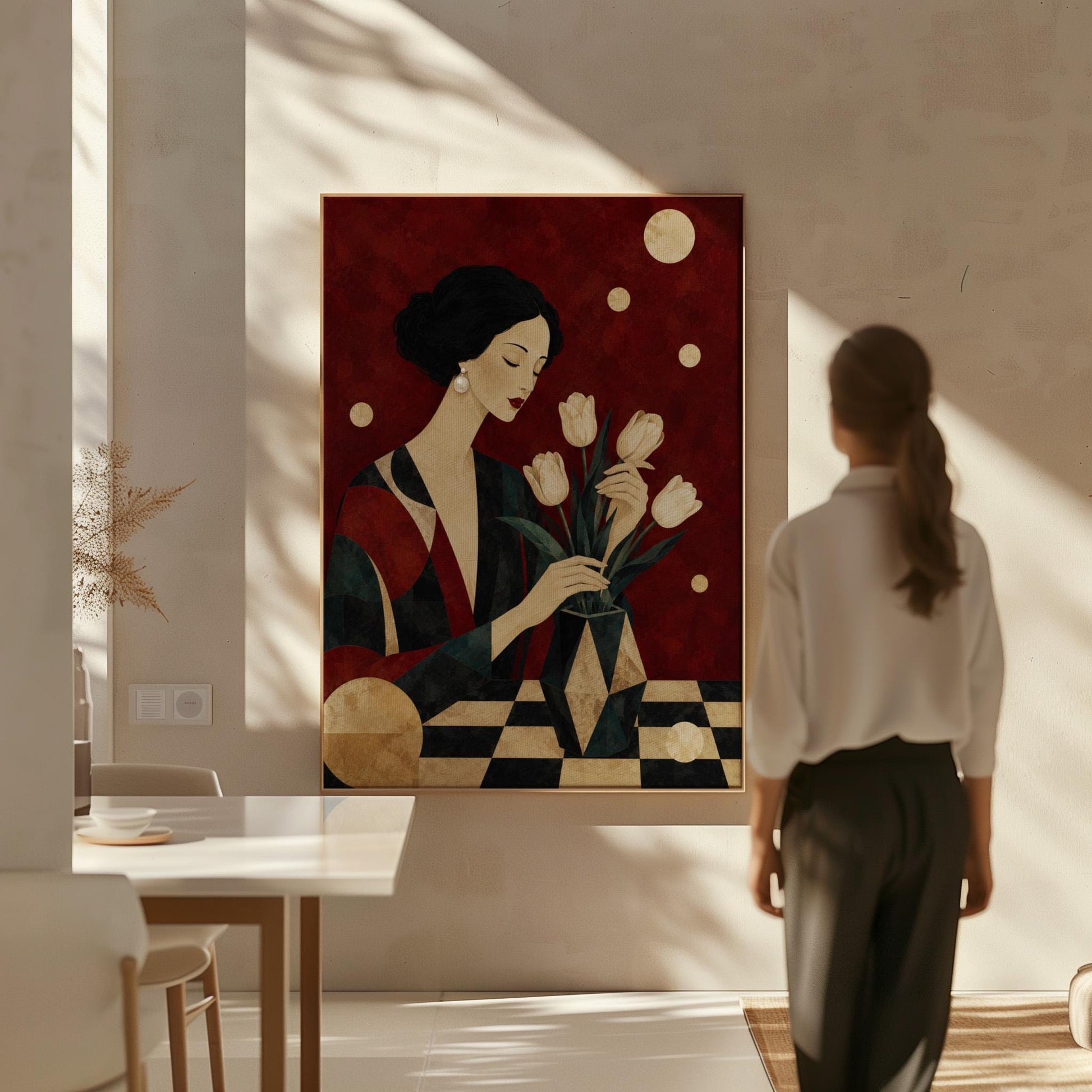 Elegant woman arranging pale cream tulips in a dark geometric vase, canvas wall art styled against a soft white wall