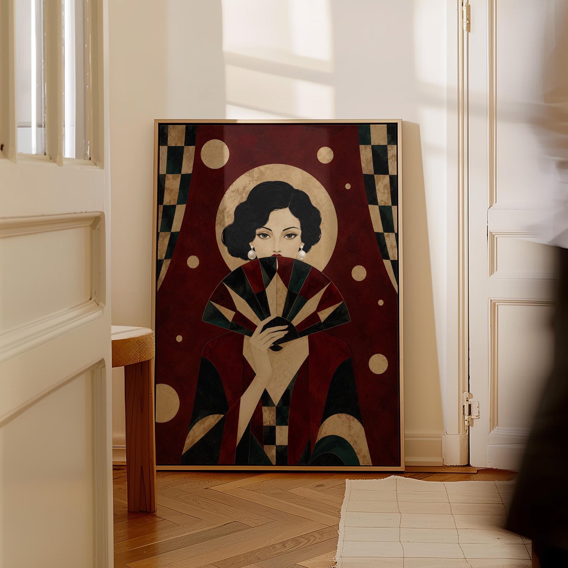 Woman holding a pleated fan to her chin inside a gold halo circle, canvas print seen in a warm interior with natural light
