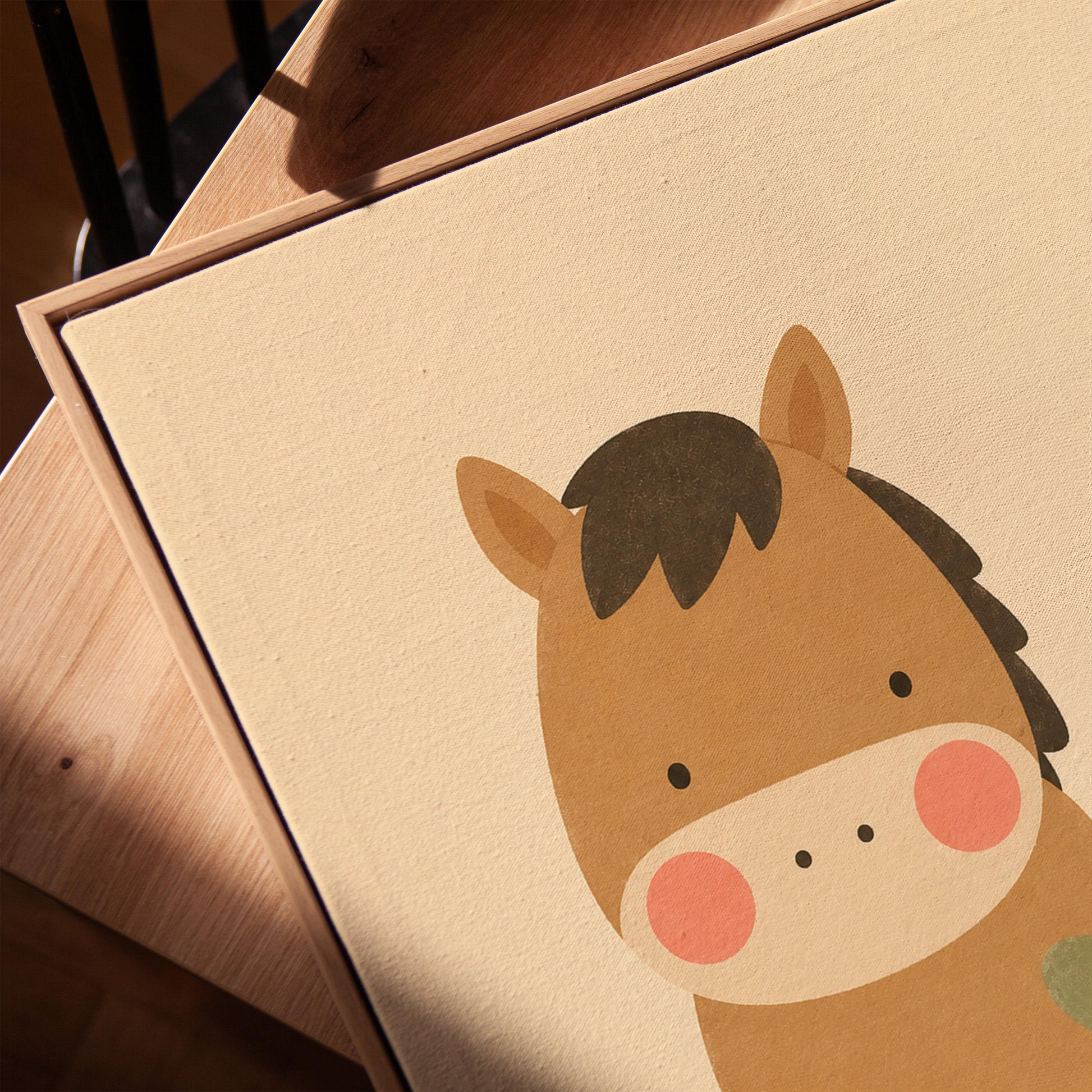 Brown pony standing beside a tiny cowgirl in a green hat, canvas print in a warm, minimally styled interior