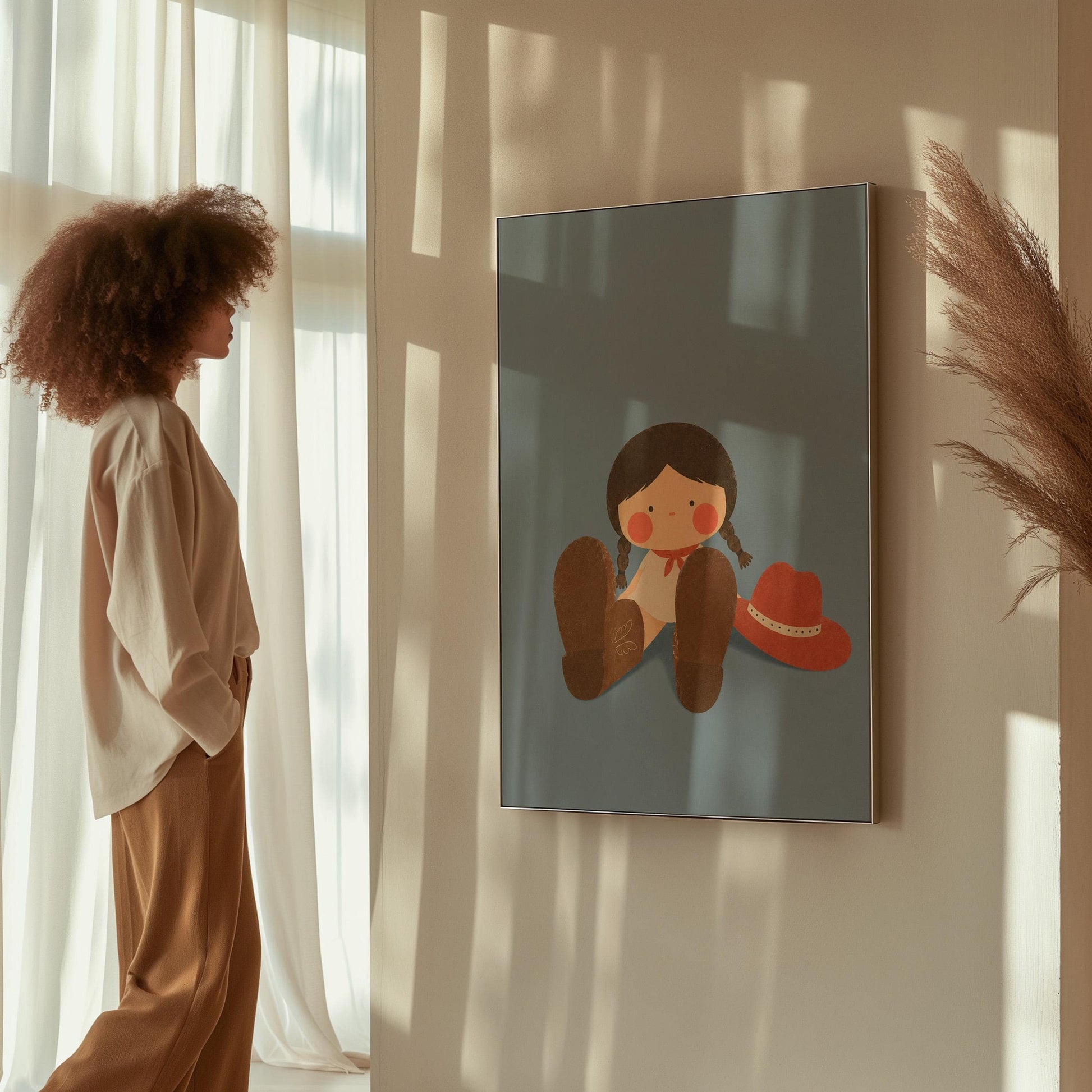 Little cowgirl sitting with big brown boots and a red hat, canvas print shown in a sunlit, contemporary room