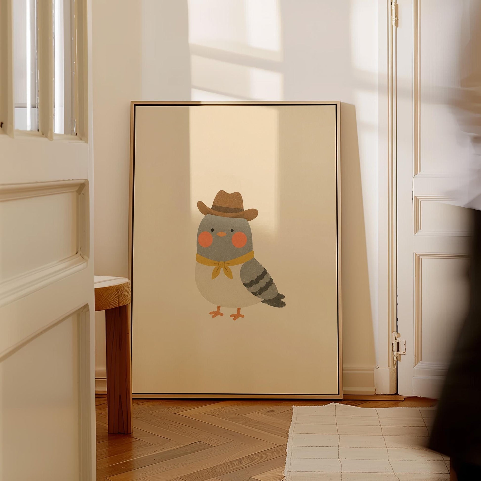 Round grey bird wearing a tiny cowboy hat and yellow bandana, canvas print styled against a soft white wall