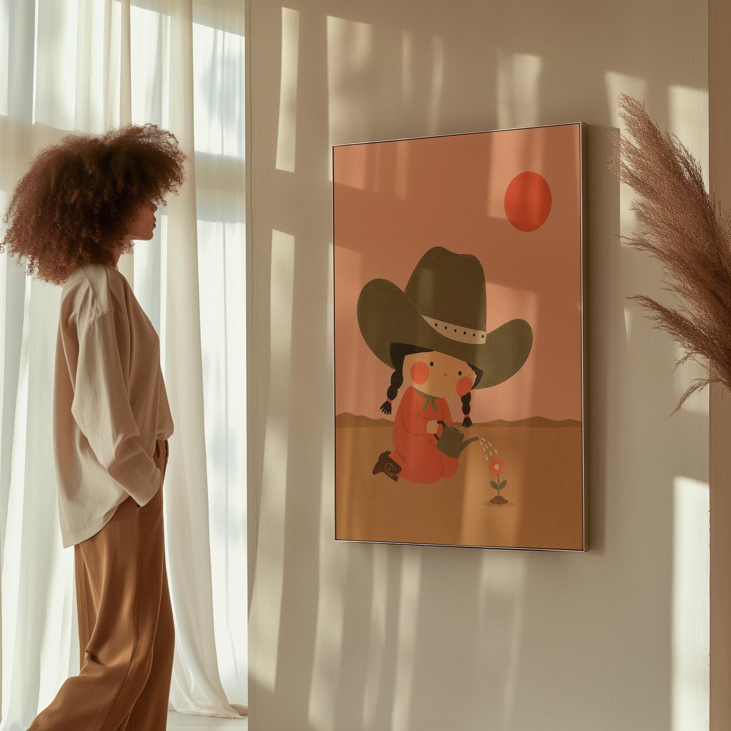 Cowgirl in a green hat watering a small flower in the desert, canvas wall art styled against a soft white wall