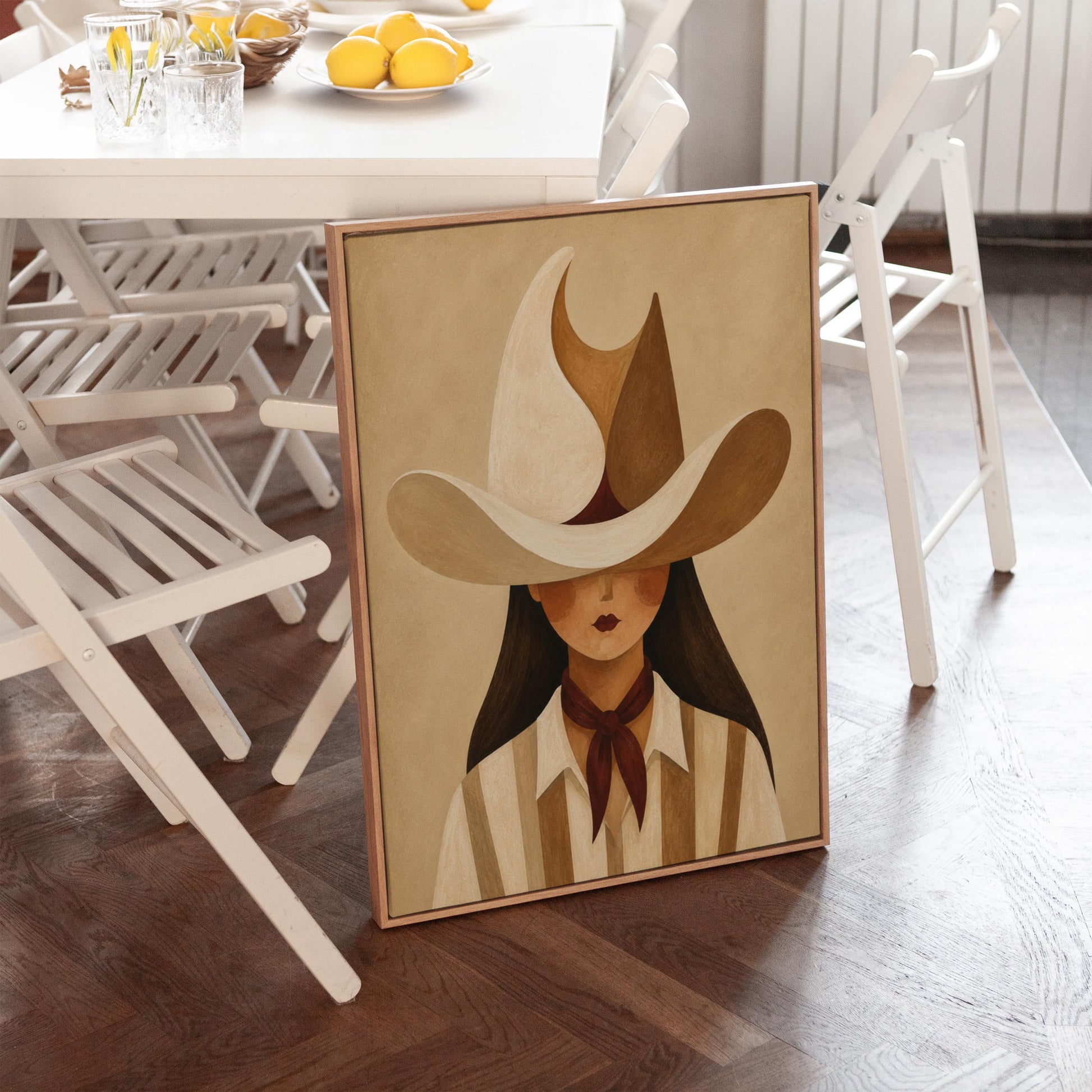 Cowgirl beneath a curling cream and brown wave shaped hat, canvas print shown in a sunlit, contemporary room