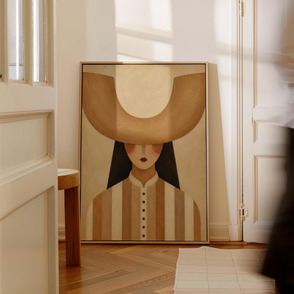 Faceless cowgirl under an enormous curved tan cowboy hat brim shape, canvas print styled against a soft white wall