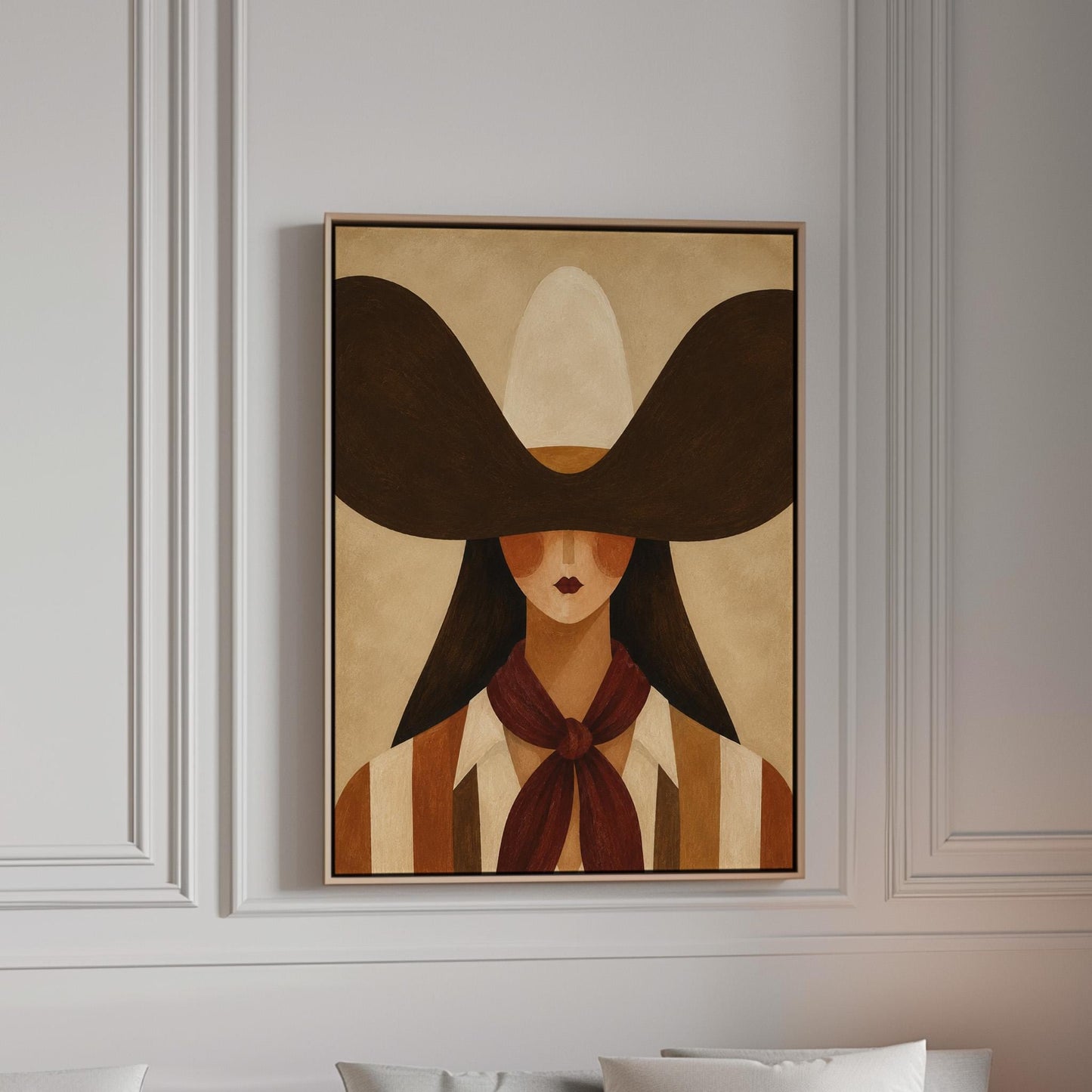 Faceless cowgirl in a wide black hat and mauve neckerchief on tan background, canvas print in a bright room with natural daylight