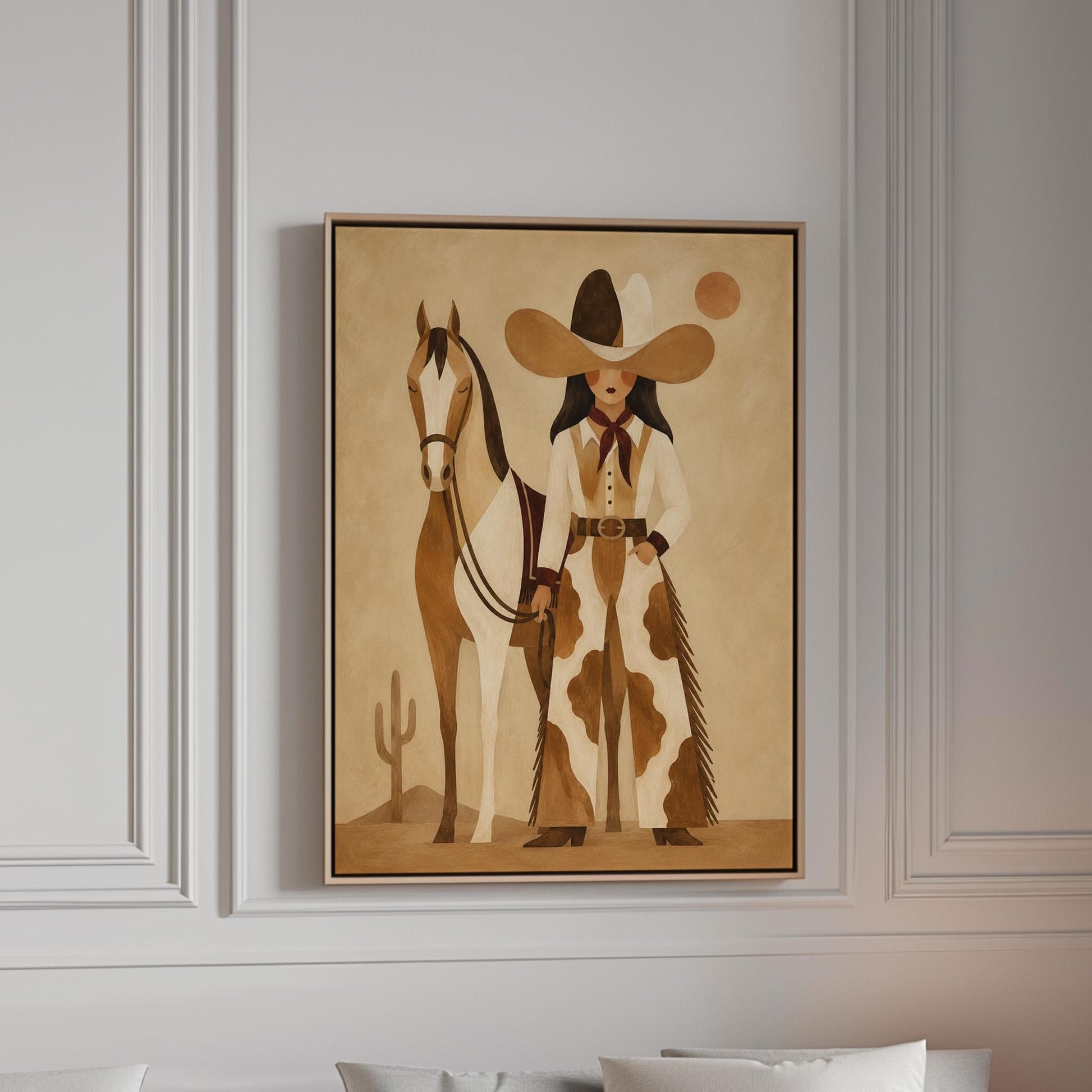 Cowgirl in cow print chaps standing beside a horse in a warm desert scene, canvas print in a bright room with natural daylight