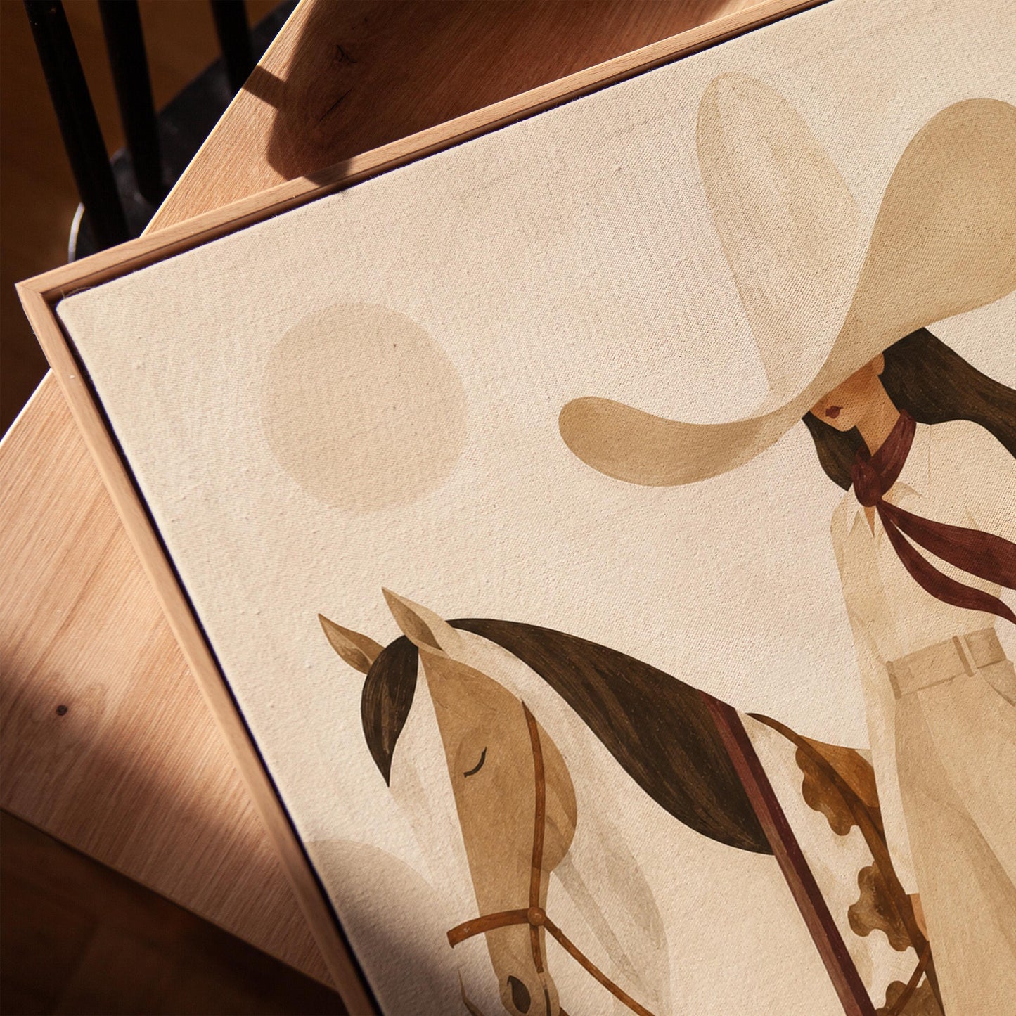 Cowgirl in cream trousers with a red scarf standing by a white horse, canvas print in a warm, minimally styled interior