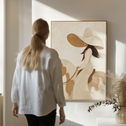 Woman in a long white dress and floppy hat riding a spotted horse, canvas wall art styled against a soft white wall