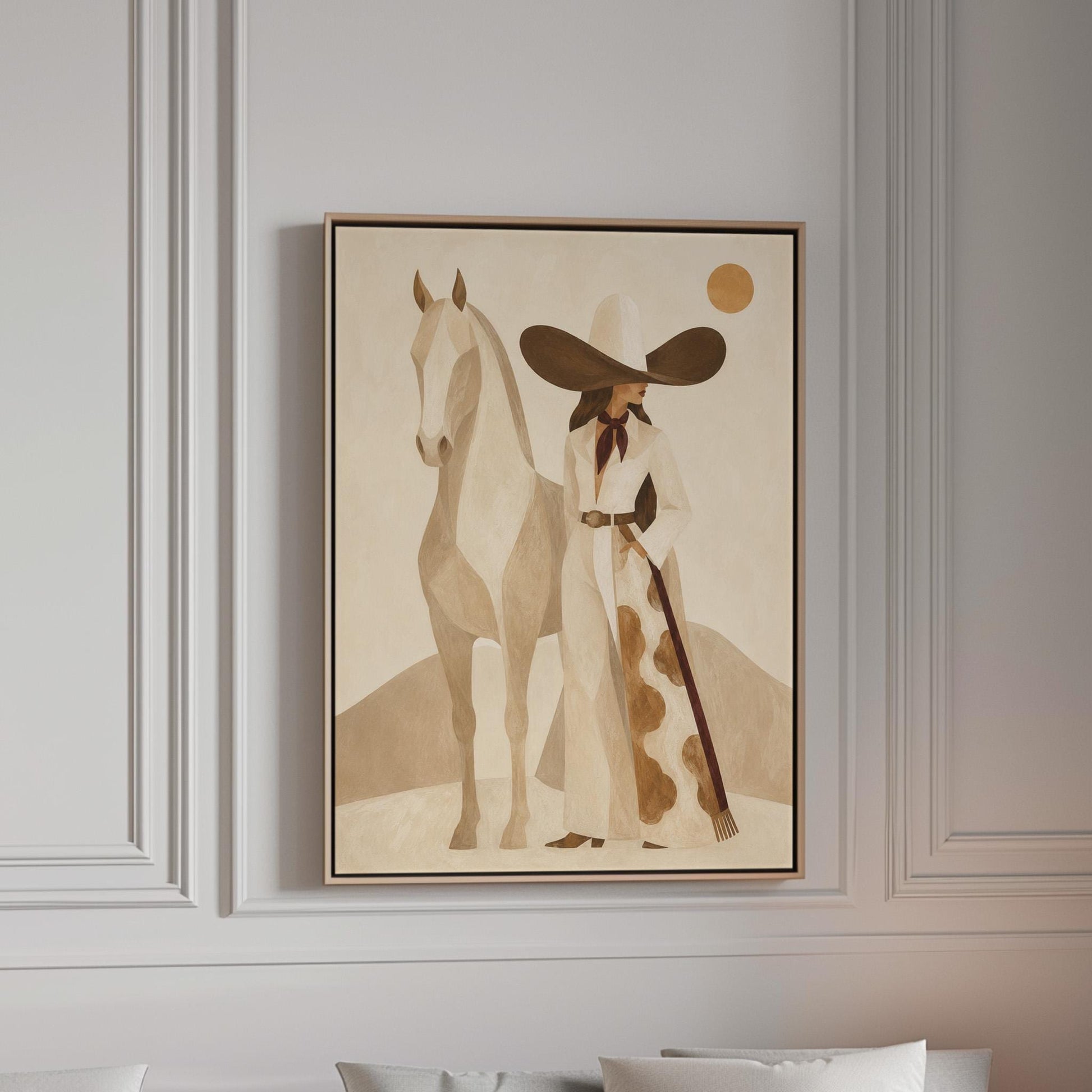 Cowgirl in a dark hat with a pale horse before soft desert hills, canvas print in a bright room with natural daylight
