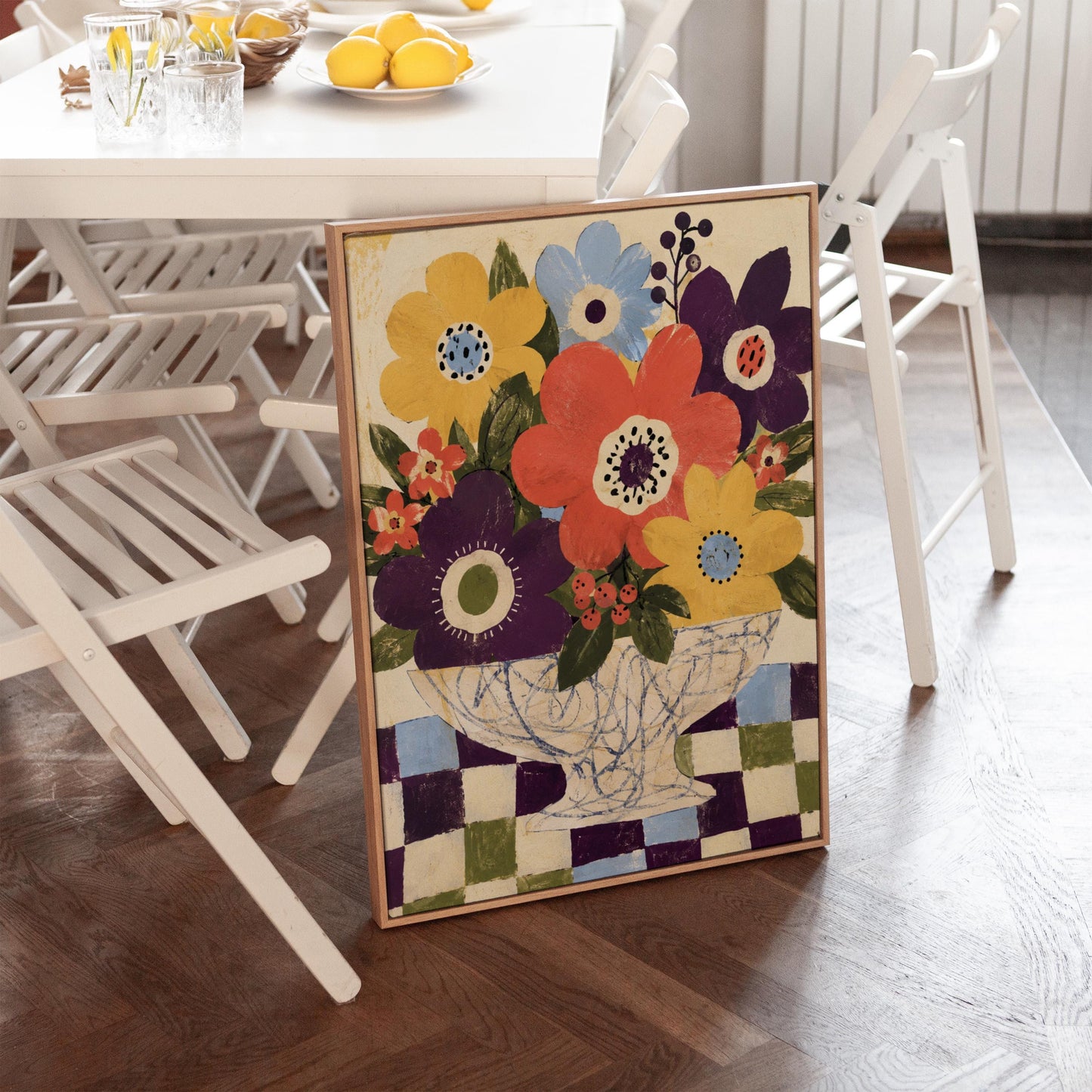 Bright folk bouquet in a white urn set on a checkerboard tabletop, canvas print hanging in a calm, modern living space