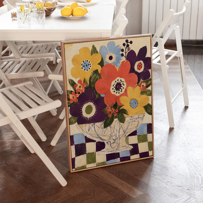 Bright folk bouquet in a white urn set on a checkerboard tabletop, canvas print hanging in a calm, modern living space