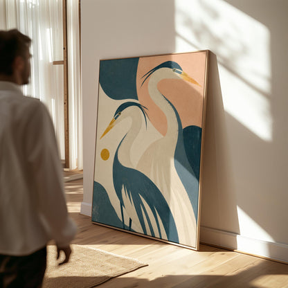 Two great herons with yellow beaks against a peach and teal sky, canvas print hanging in a calm, modern living space
