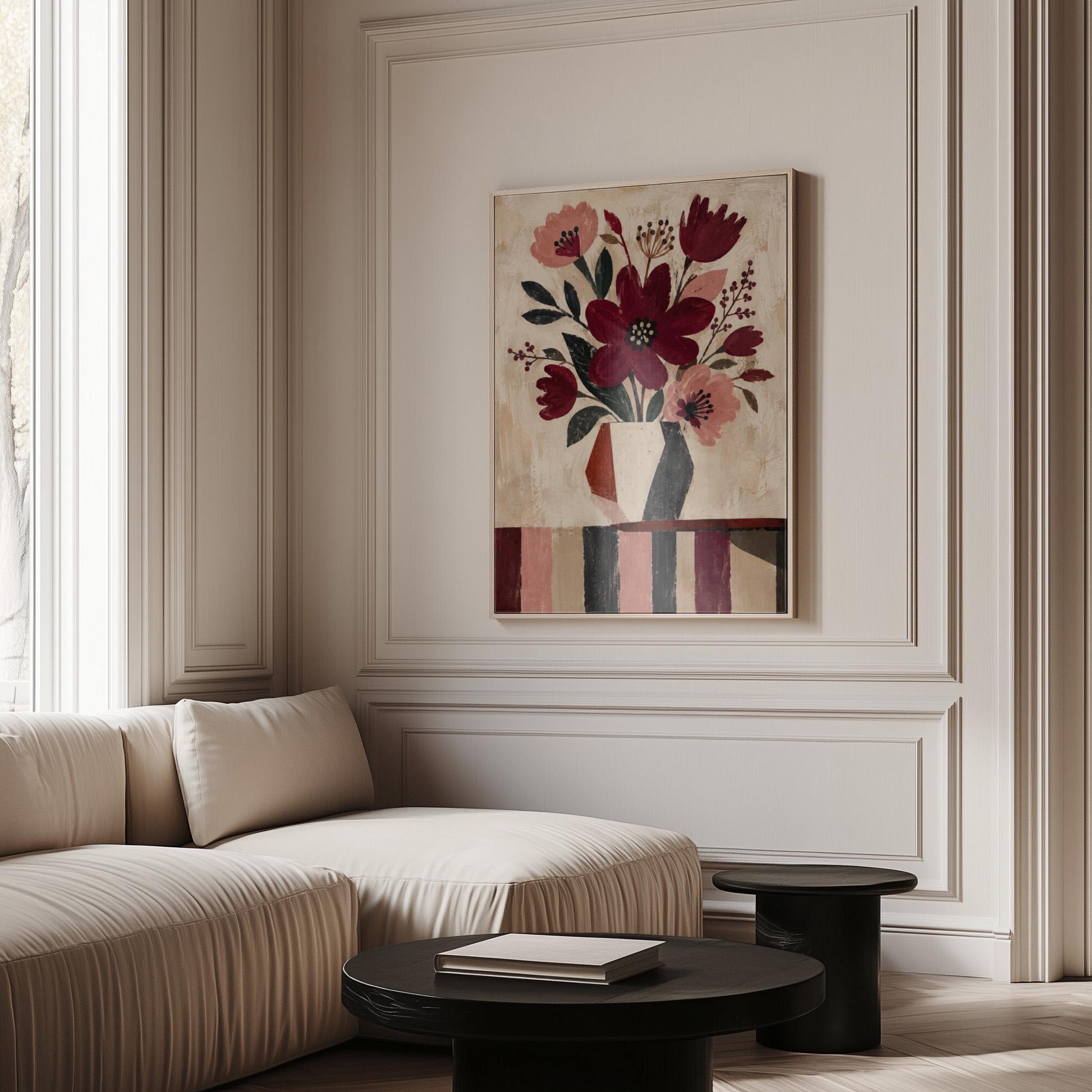 Burgundy and dusty pink flowers in a striped vase on a striped table, canvas wall art styled against a soft white wall