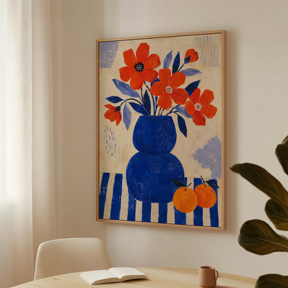 Scarlet poppies in a cobalt vase with oranges on a blue striped cloth, canvas print styled against a soft white wall