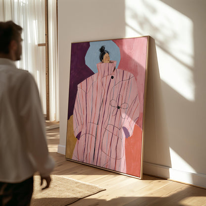Woman in an oversized pink striped coat against plum and coral blocks, canvas print seen in a warm interior with natural light