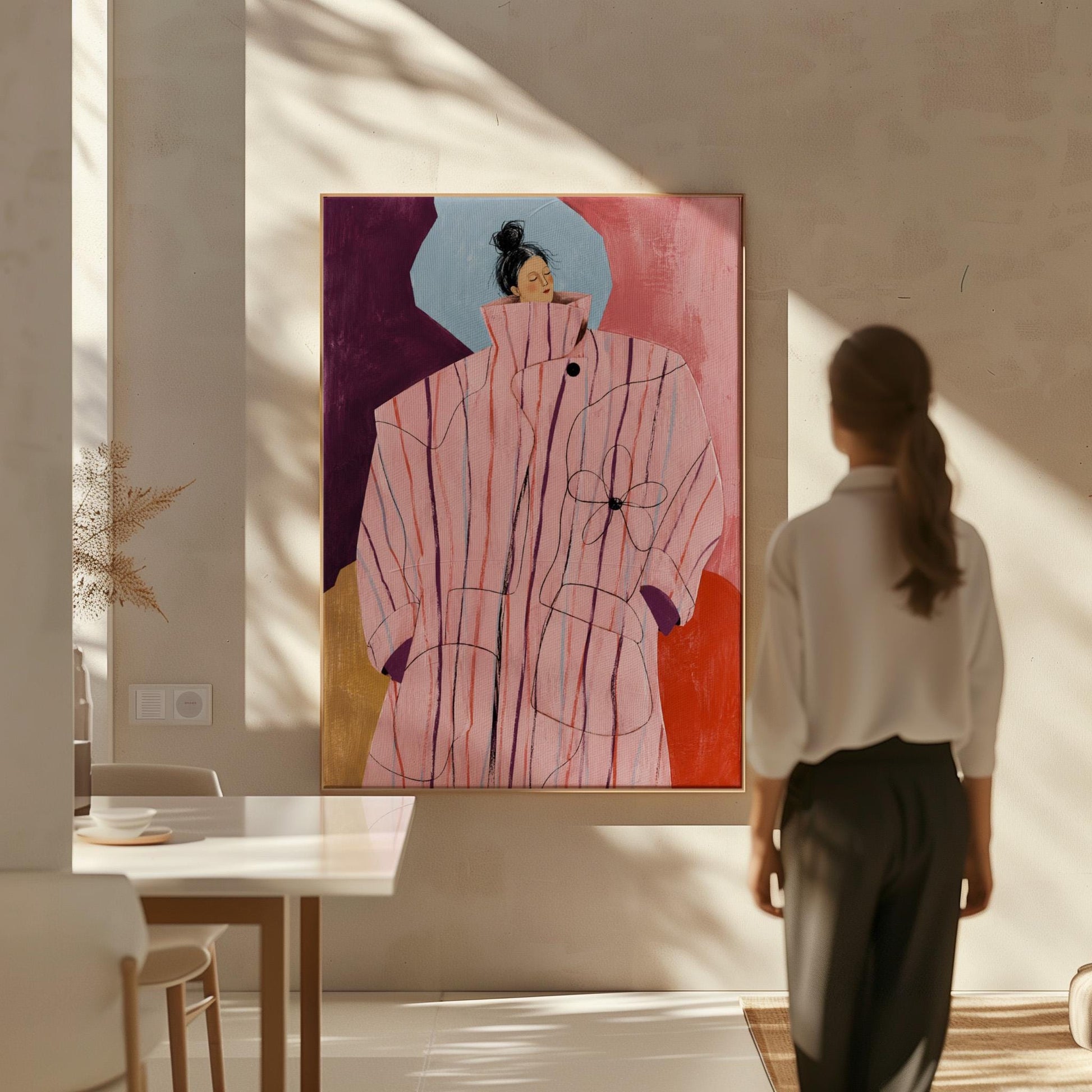 Woman in an oversized pink striped coat against plum and coral blocks, canvas wall art styled against a soft white wall