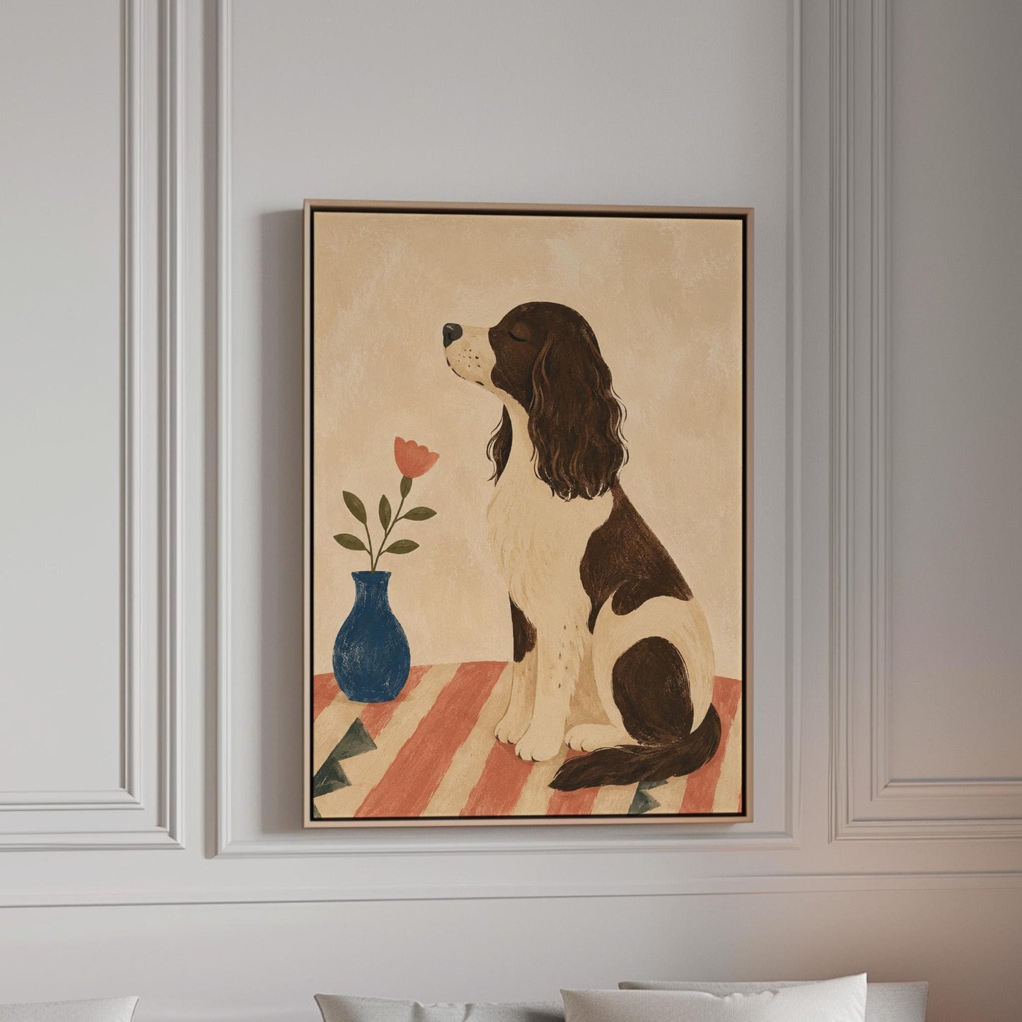 Brown and white spaniel sniffing a coral tulip in a small blue vase, canvas print in a bright room with natural daylight