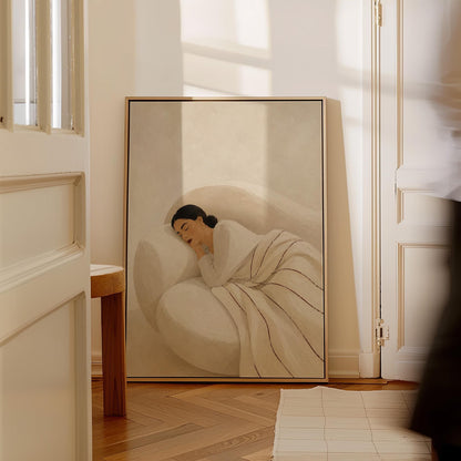 Woman sleeping under a white quilt threaded with fine burgundy lines, canvas print on a quiet wall in a considered interior