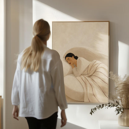 Woman sleeping under a white quilt threaded with fine burgundy lines, canvas print displayed on a neutral wall in a styled interior