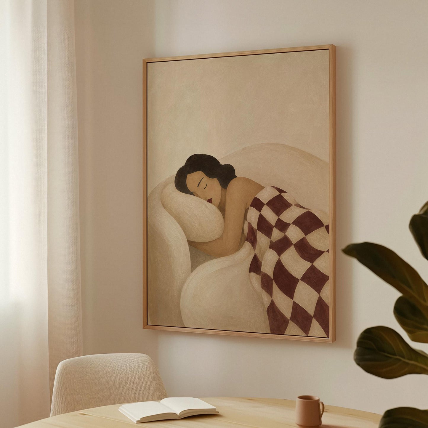 Woman sleeping under a burgundy and cream checkerboard blanket, canvas print styled against a soft white wall