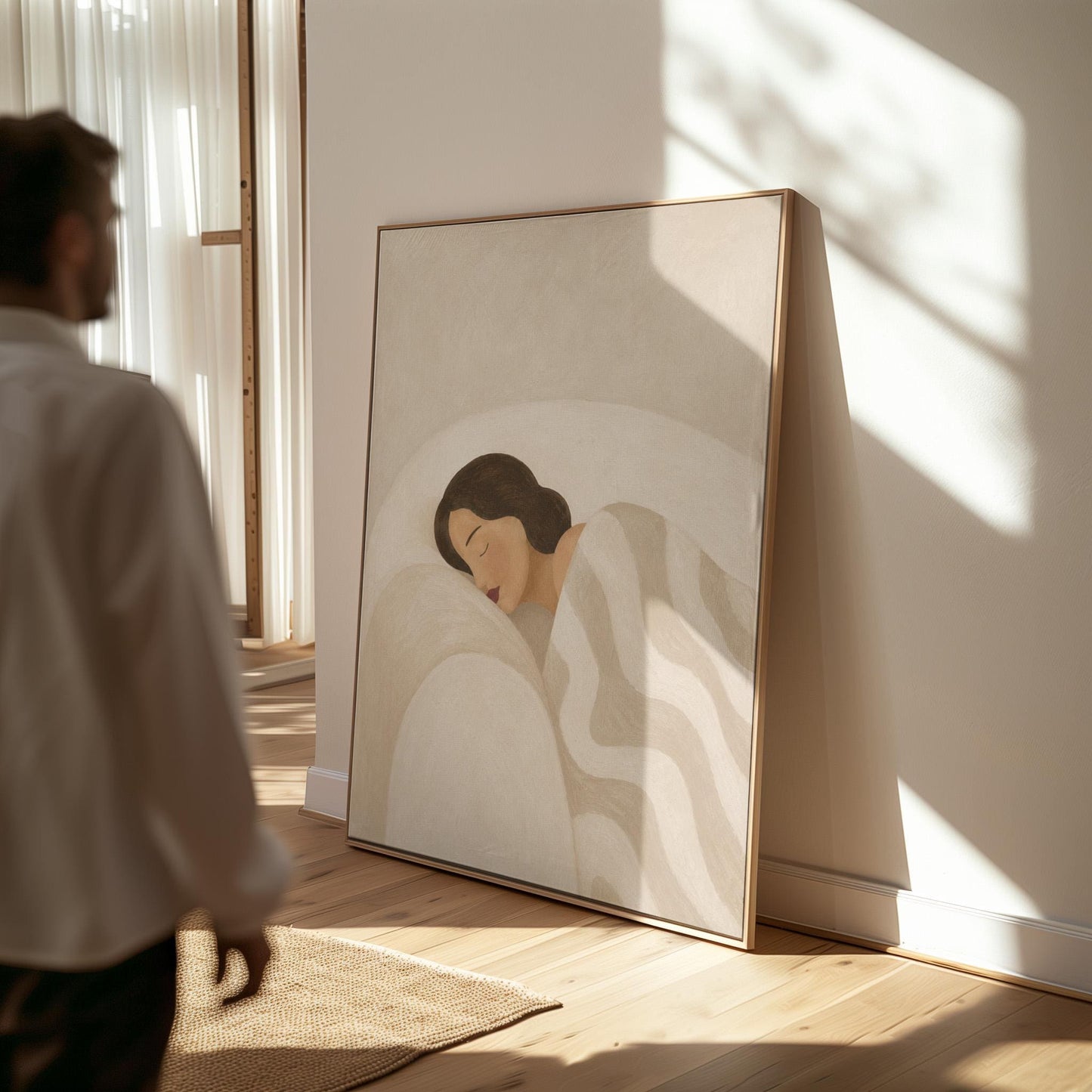 Woman asleep beneath a quilt of rolling cream and sand wave shapes, canvas wall art hanging in a calm, modern living space