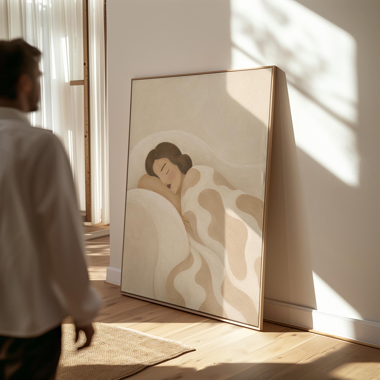 Woman sleeping under a cream blanket with soft camel cloud shapes, canvas print shown to scale in a furnished room