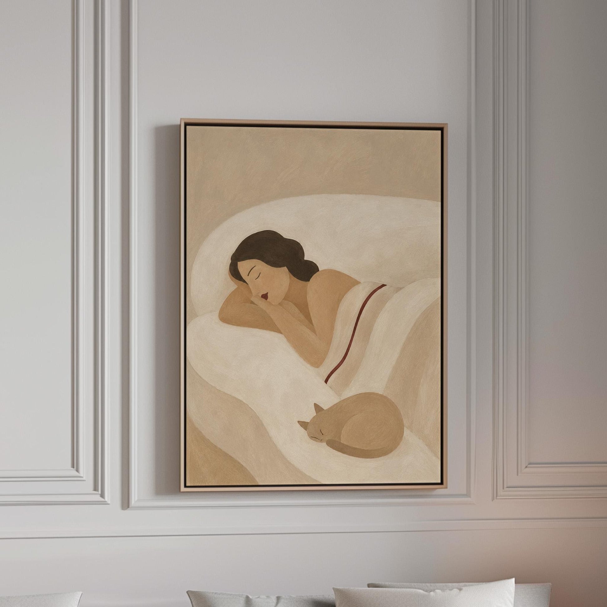 Woman sleeping with a small white cat curled at the foot of the bed, canvas print in a bright room with natural daylight