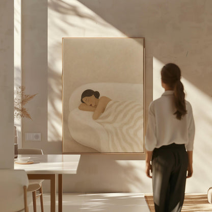 Woman sleeping with hands under her cheek beneath a soft striped quilt, canvas print shown in a sunlit, contemporary room
