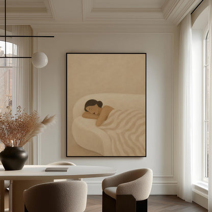 Woman sleeping with hands under her cheek beneath a soft striped quilt, canvas wall art on a quiet wall in a considered interior