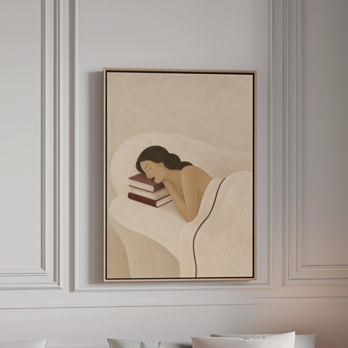 Woman resting her cheek on a stack of cream and burgundy books, canvas print in a bright room with natural daylight