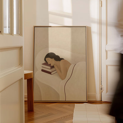 Woman resting her cheek on a stack of cream and burgundy books, canvas print on a quiet wall in a considered interior
