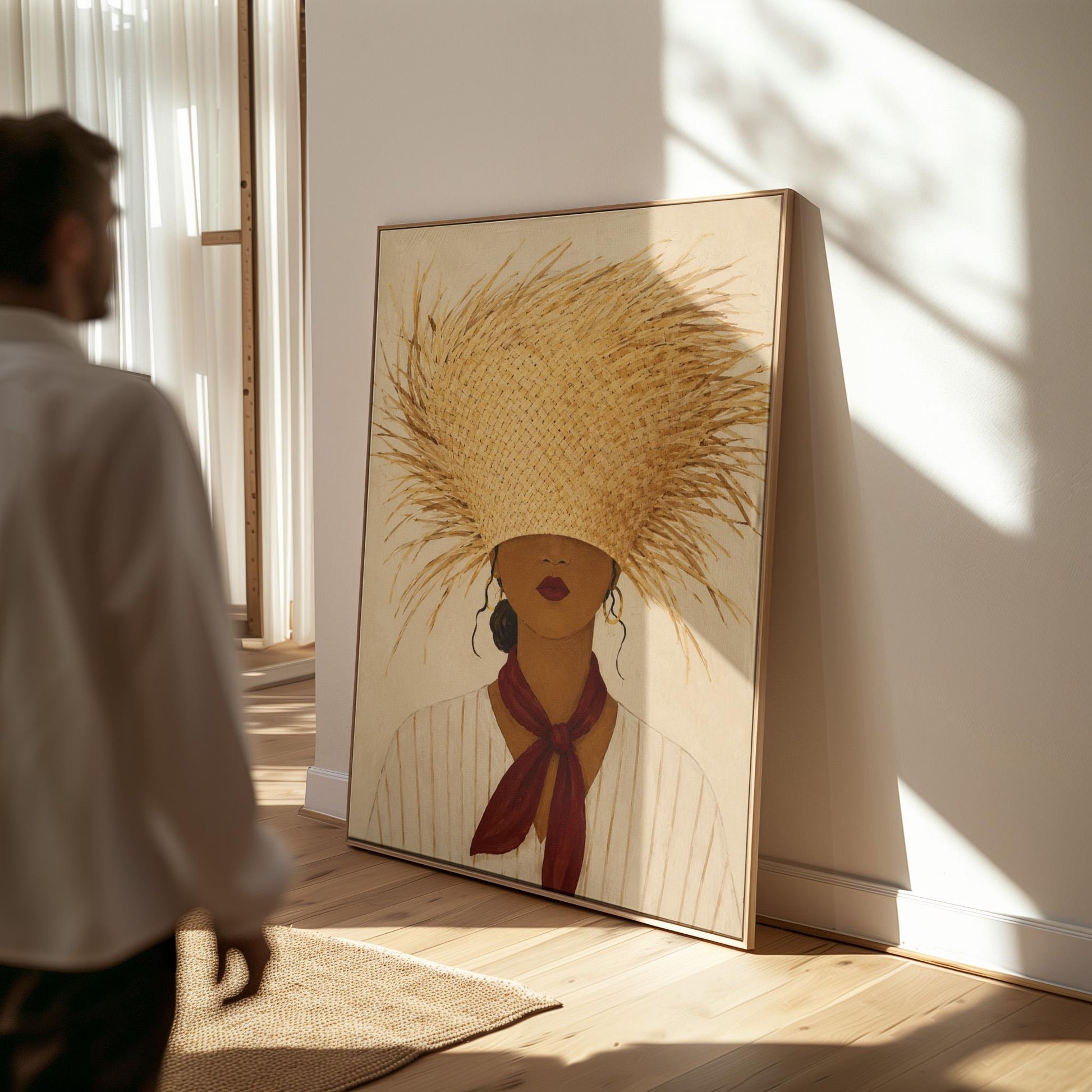 Woman in a huge fringed straw hat with a red scarf and striped shirt, canvas print on a quiet wall in a considered interior
