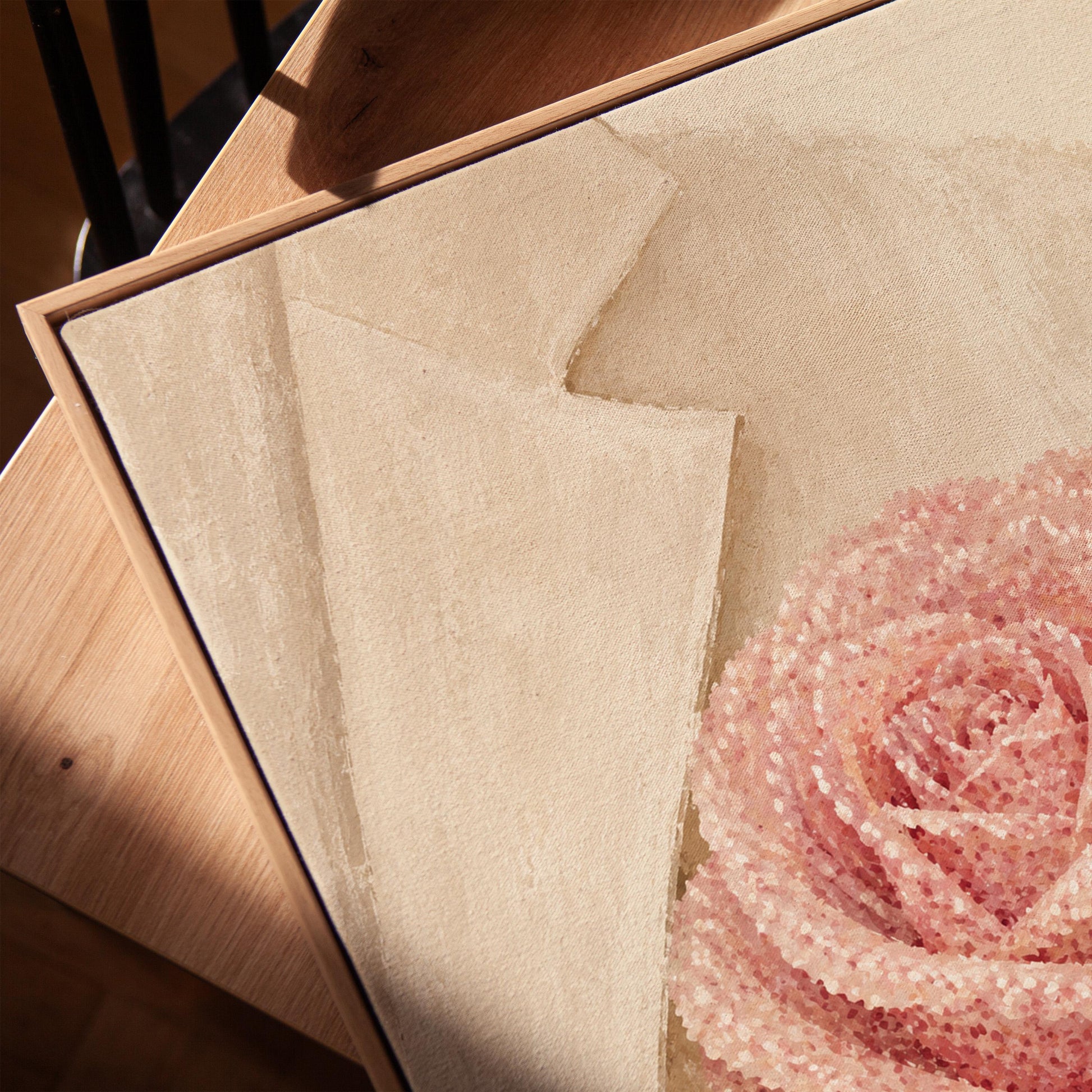 Blush pink rose with pearl beaded petals tucked into a cream pocket, canvas print in a warm, minimally styled interior